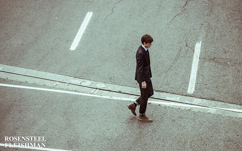 Businessman Crossing the Road at a Crosswalk