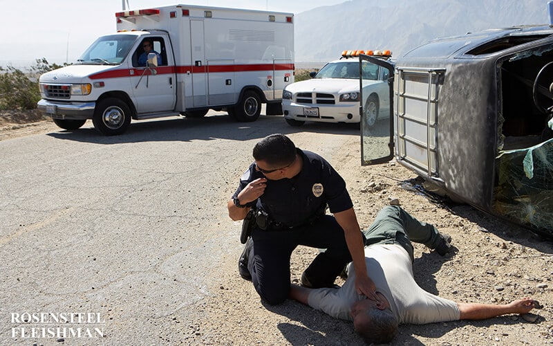 Car Accident with Injured Man and Police Emergency Response