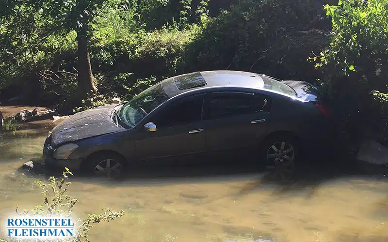 Car Stuck in Water After an Accident