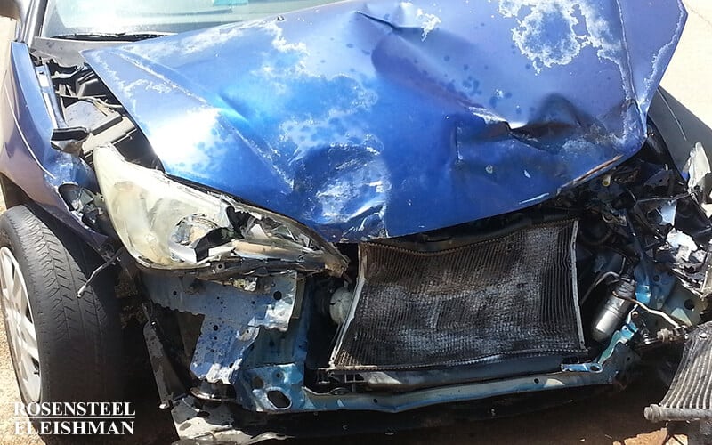 Car with Front-End Damage After an Accident