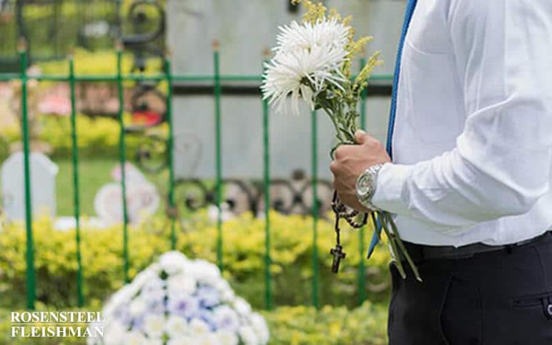 Man at Graveyard with Flowers in North Carolina