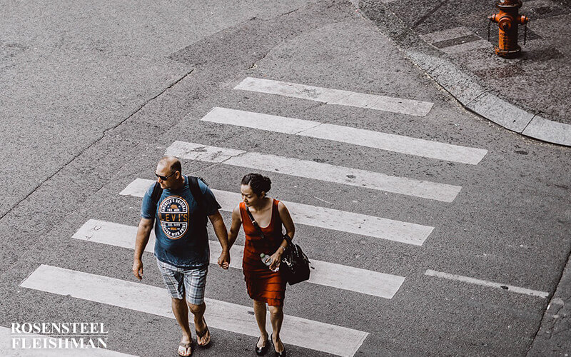 People Crossing the Road at a Crosswalk