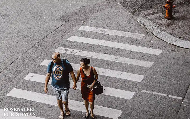 People Crossing the Road at a Crosswalk