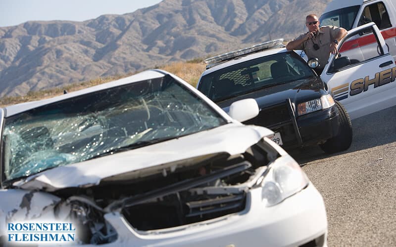 White Car Involved in Accident with Police Responding