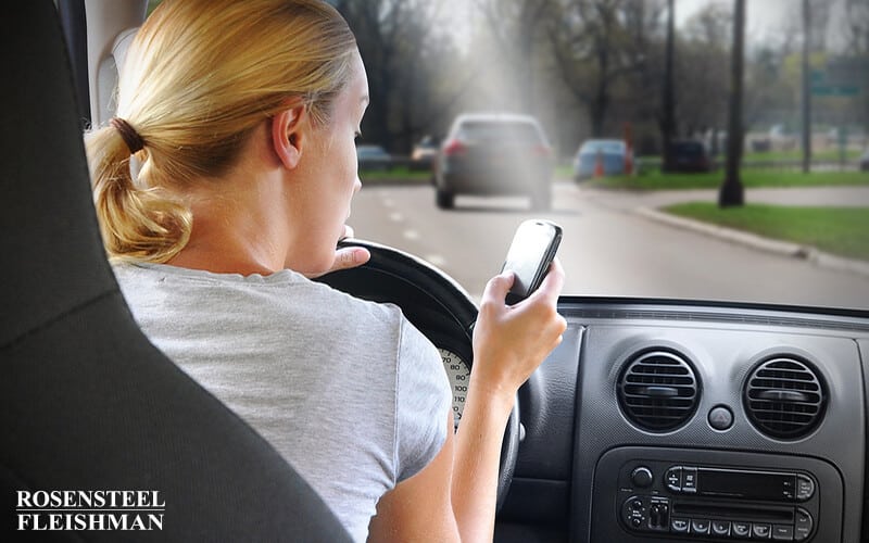 Woman Texting on Phone While Driving